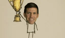 a crudely drawn man holding a giant golden cup. He has the face of John Waldron