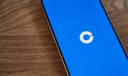 Coinbase's logo on a phone.