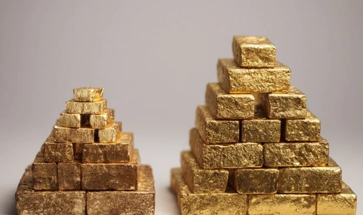 small gold pyramids