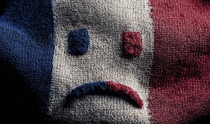 Sad face in a French flag