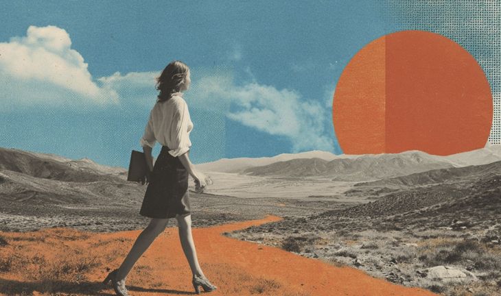 a woman walking in the desert