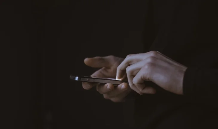 holding a phone 