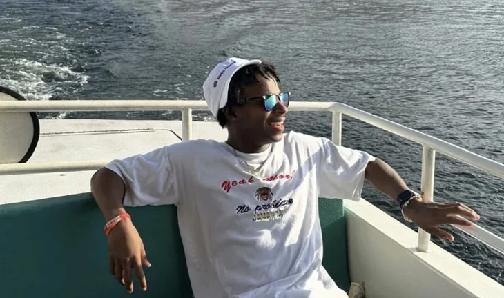 Demarre Johnson on a boat 