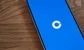 Coinbase's logo on a phone.